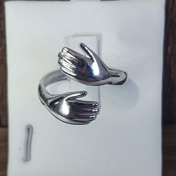 Silver Stainless Steel Hug Hands Adjustable Ring New - Picture 1 of 6